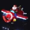 Goodsright Decor House Ornaments Christmas LED Santa Ornament Santa Claus Flying Plane Santa Sculpture for Holiday Xmas Party Supplies Miniature Gifts